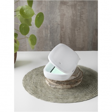 Logotrade promotional products photo of: Capsule UV smartphone sanitizer with 5W wireless charging pad