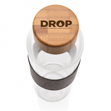 Logo trade firmakingitused foto: Impact boorsilikaatklaasist pudel bambusest kaanega